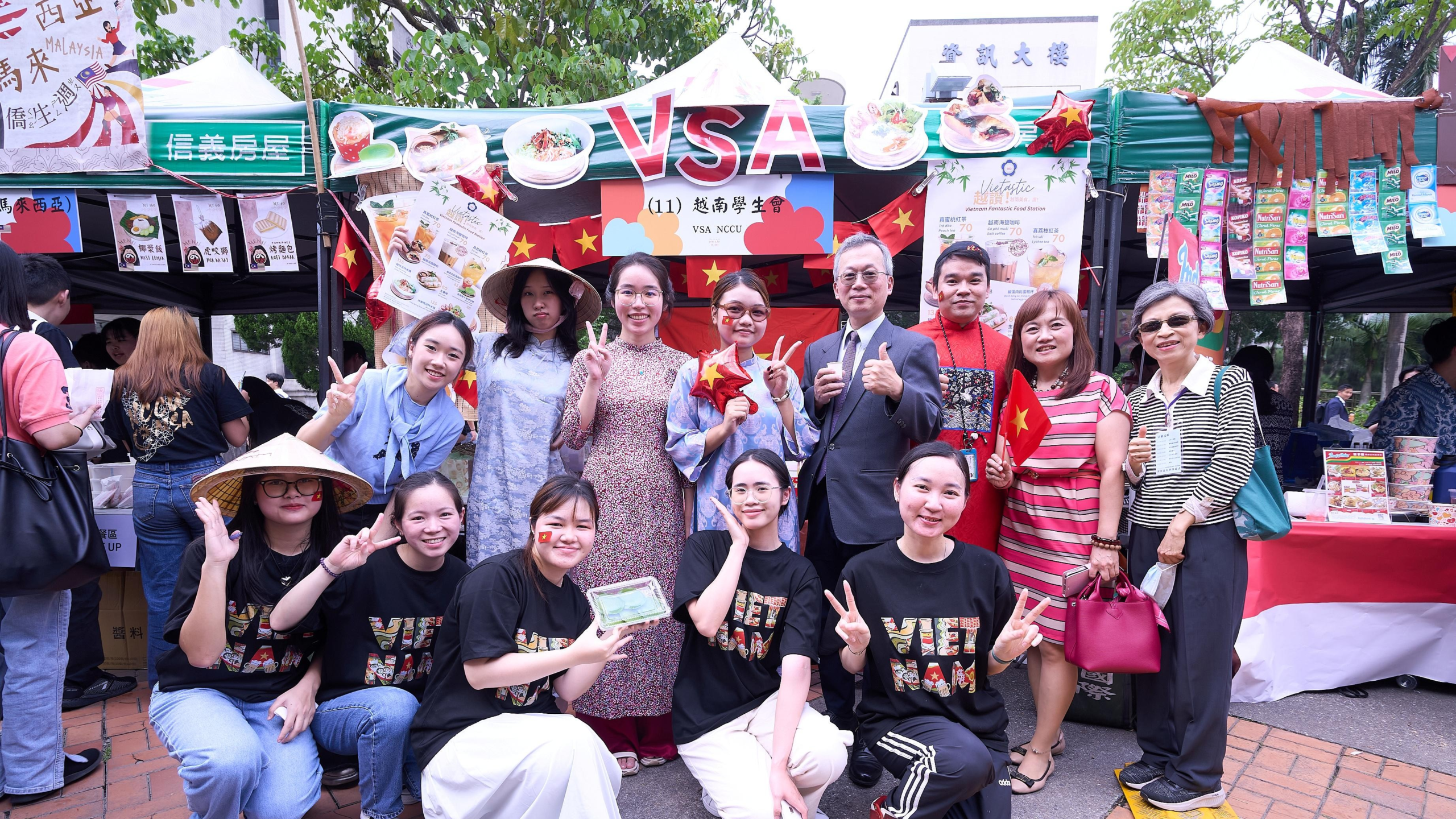 Vietnamese Student Association members and guests gathered at a campus cultural booth.